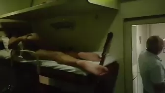 The Girl is Naked on the Train, and People are Standing Nearby