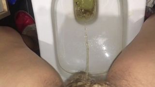 Hairy snatch pee in the toilet