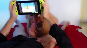 Blonde Slut gives him a oral sex while he plays the Nintendo Switch