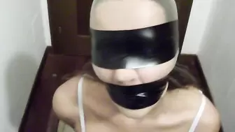 BLINDFOLDED AND GAGGED SLAVE TIED UP ON A CHAIR