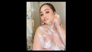 Busty Thai liking soaping her massive titties????????