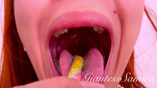 Samira sucks long gummies, puts them in her throat, swallows them, drools and sucks them