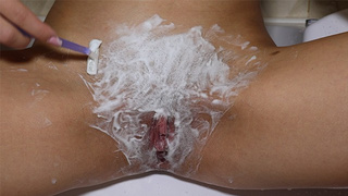 Pretty blonde with natural breasts shaves snatch! POINT OF VIEW!