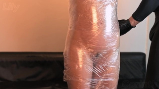 Innocent MILF signs up for BDSM session, gets wrapped up in plastic foil and boned | Lily Corinth