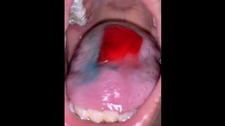 Teen Girl Eating Candy Mouth up Close POV