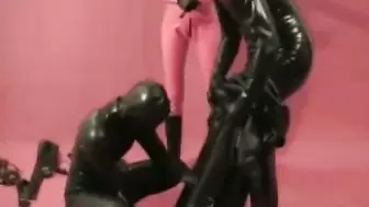Threesome Latex Catsuits two Femdom Girls Bondaged Slave in Straightjacket