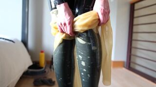 The Chick Pulls on the second Layer of Latex