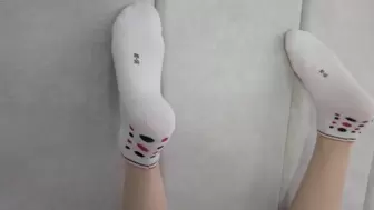 I Train Feet in White Socks Lying on my Stomach and Thinking about Sex